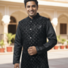 Black_Kurta_Pyjama_and_Velvet_Nehru_Jacket_Set.png